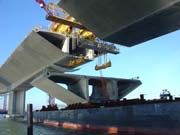 A section of the deck is lifted into place