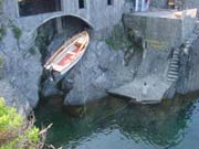 In Manarola, a crane is used to lower boats into the sea